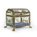 A Brass-Mounted Glass Casket, Possibly French, oblong and on paw feet, with twisted wire borders,