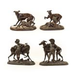 Four early 20th century French patinated spelter groups of greyhounds, three modelled with