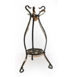 A 19th century painted wrought iron kettle stand