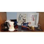 A group of advertising wares including a Newcastle Brown Ale enamel sign, various beer, cognac and