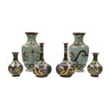 A pair Chinese of cloisonne vases, turquoise ground decorated with dragons chasing a flaming