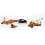 Three Brass-Mounted Velvet Purses, two cartouche shaped and with tassels, one stitched with
