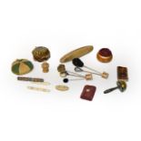 A collection of sewing accessories including pin cushions, needle case, hat pins etc