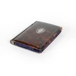 A Silver Inlaid Tortoiseshell Card-Case, oblong, the hinged cover with silver inlaid vacant