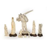 A selection of early 20th century ivory okimonos, and two bone Chinese pieces (8)