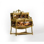 A Brass-Mounted Faux Tortoiseshell Box, in the form of a desk, hinged in two places which open to