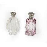 Two Silver-Mounted Cut-Glass Scent-Bottles, One Circa 1840, oval clear glass, the hinged cover