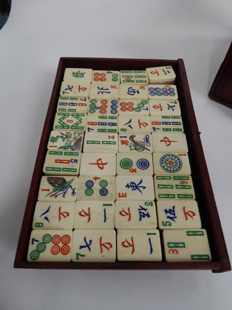 A cased bone Mahjong set. Size of the box 24cm by 17cm by 17cm. The box a little tired, the back - Image 14 of 20