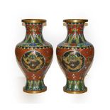 A pair of Cloisonne vases, early 20th century. Both vases with elements of pitting and some light