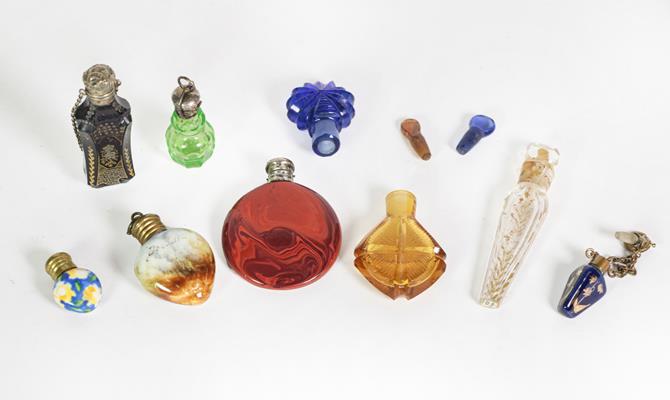 Seven Various Glass Scent-Bottles, various shapes, including: a circular red aventurine glass