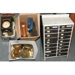 A quantity of clock movements, watchmakers cabinet of small drawers, electric tower clock motor