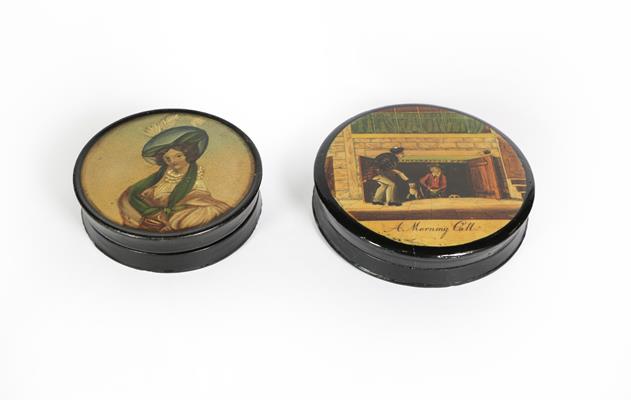 Two Victorian Papier Mache Snuff-Boxes, each circular and with pull-off cover, the cover of one