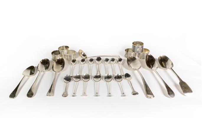 A group of silver spoons and napkin rings, a serving spoon, George III, Newcastle, another Victorian