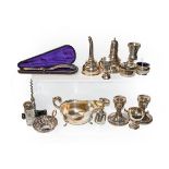 Silver to include: a wine funnel, sauce boa,t a tea strainer, egg cup, pair of dwarf candlesticks,