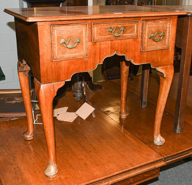 A satinwood inlaid walnut lowboy, 76cm by 49cm by 72cm