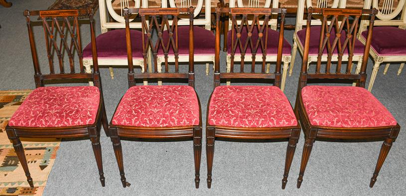 A set of four Regency inlaid mahogany dining chairs