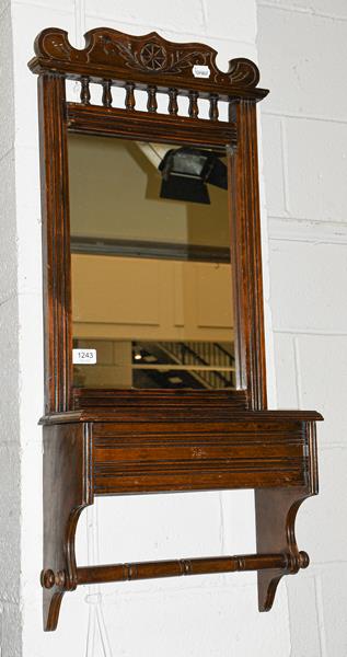 An early 20th century mahogany hall mirror with integral glove box, 42cm by 17cm by 90cm