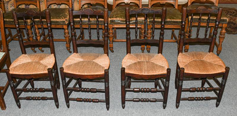 A set of four rush seated country chairs