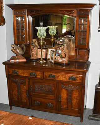 An early 20th century Arts & Crafts oak and walnut mirror-back sideboard, 142cm by 56cm by 188cm