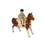 Beswick Girl on Pony, model No. 1499, skewbald gloss