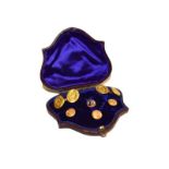 A pair of Victorian cufflinks and three dress studs, stamped '18CT' and an enamel dog dress stud (