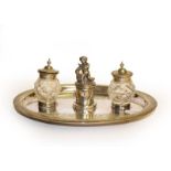 A silver plated inkwell desk stand, presentation inscription ''Presented to James Powell Esq,