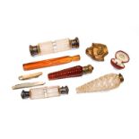 Five glass scent bottles including Victorian double sided examples and one cut ruby glass with