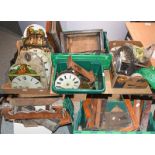 A quantity of clock case mouldings including, clock seat boards, wooden wall clock dial and
