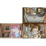 A selection of watchmakers tools including a watch lathe, staking tool cased set, case back watch