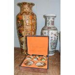 A large 20th century floor standing vase in the Oriental taste decorated with flowers, with mark