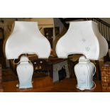 A pair of pottery table lamps of square baluster form, the bases 39cm high