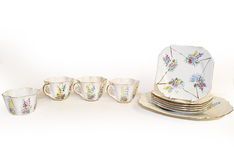 A Shelley tea set (later decorated) and a Limoges Art Nouveau iridescent vase, 18cm . The teaset has - Image 3 of 3