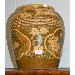A Chinese stoneware slipware finish jar decorated with cranes, 38cm high