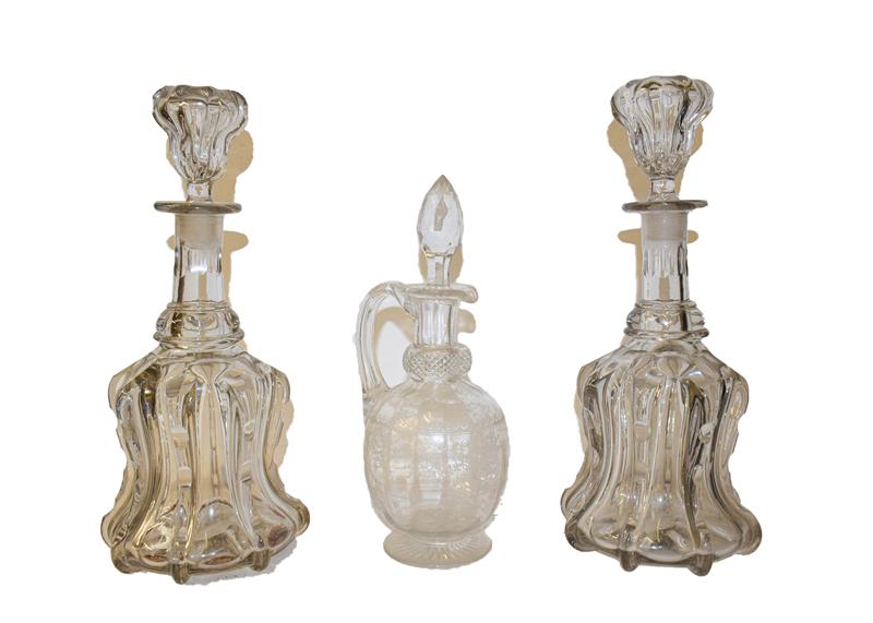 A pair of ship decanters, together with a pair of Victorian mallet form decanters, and a glass