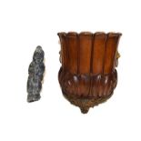 A pair of Empire style bronze candlesticks (converted), a carved mahogany planter with gilt metal