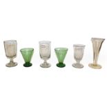 A collection of mainly 19th century glassware including glass rinsers, a large ale glass on folded