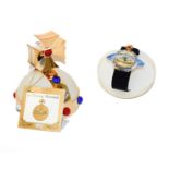 Three Swatch wristwatches comprising a Vivienne Westwood Orb design Pop wristwatch, a Christmas