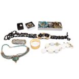A quantity of costume jewellery including a Vivienne Westwood bracelet, beaded necklaces, bangles,