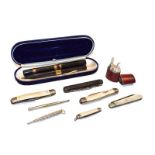 A cased Waterman's pen set with 9 carat gold mounts together with other jewellery and collectable's,