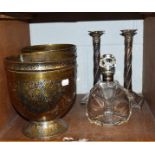 A pair of floral decorated Bidriware brass planters, glass decanter, and a pair of silver plated
