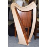 Modern small half-sized harp, with modern soft case and instruction book