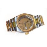 A stainless steel and gold plated automatic calendar centre seconds wristwatch, signed Eterna Matic,