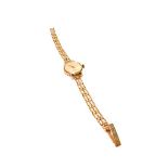 A lady's 9 carat gold wristwatch signed Zenith, the bracelet with a 9 carat gold hallmark