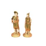 A pair of Royal Worcester figures modelled as Bringaree Indians, date code 1887, 23cm high . Good