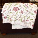 A crewelwork coverlet, leaf floral decoration