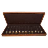 A cased set of twelve Elizabeth II parcel gilt silver teaspoons, by John Pinches, London, 1975, made