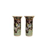 A pair of modern Chinese famille noir cylinder vases, 16cm high, a Royal Doulton series ware oval