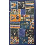 A large Indonesian Batik, decorated with animals and geometric designs over a dark blue ground,