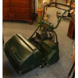 An Atco petrol lawn mower with Briggs & Stratton engine