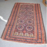 Baluch rug, the pale aubergine field of salor guls enclosed by multiple borders 183cm by 112cm